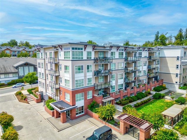 Main Photo: 403 6468 195A Street in Surrey: Clayton Condo for sale (Cloverdale)  : MLS®# R2805848