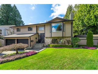 Photo 1: 6155 131 Street in Surrey: Panorama Ridge House for sale in "PANORAMA PARK" : MLS®# R2556779