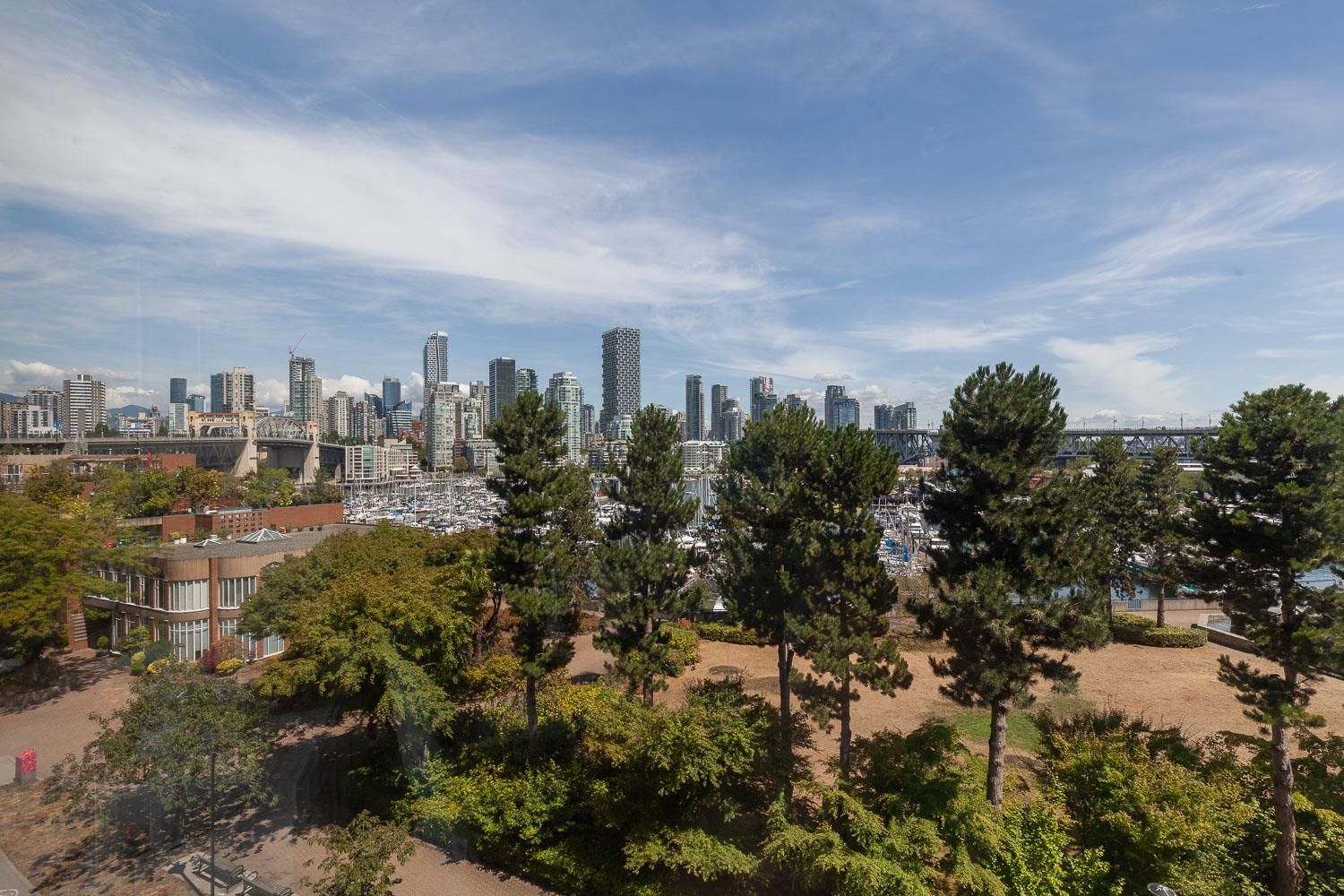 Main Photo: 411 1450 PENNYFARTHING Drive in Vancouver: False Creek Condo for sale in "HARBOUR COVE" (Vancouver West)  : MLS®# R2845827