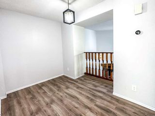 Photo 8: 267 POINT MCKAY Terrace NW in Calgary: Point McKay Row/Townhouse for sale : MLS®# A2055890