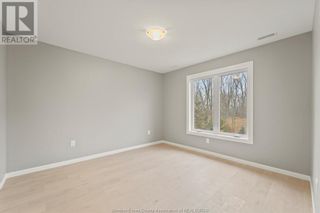 Photo 35: 150 LAKEWOOD DRIVE in Amherstburg: House for sale : MLS®# 24000508