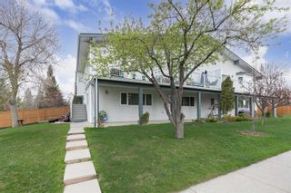 Photo 3: 3340 41 Street SW in Calgary: Glenbrook Full Duplex for sale : MLS®# A2099392