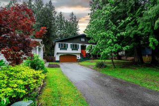 Photo 1: 19750 47 Avenue in Langley: Langley City House for sale in "Mason Heights" : MLS®# R2883240