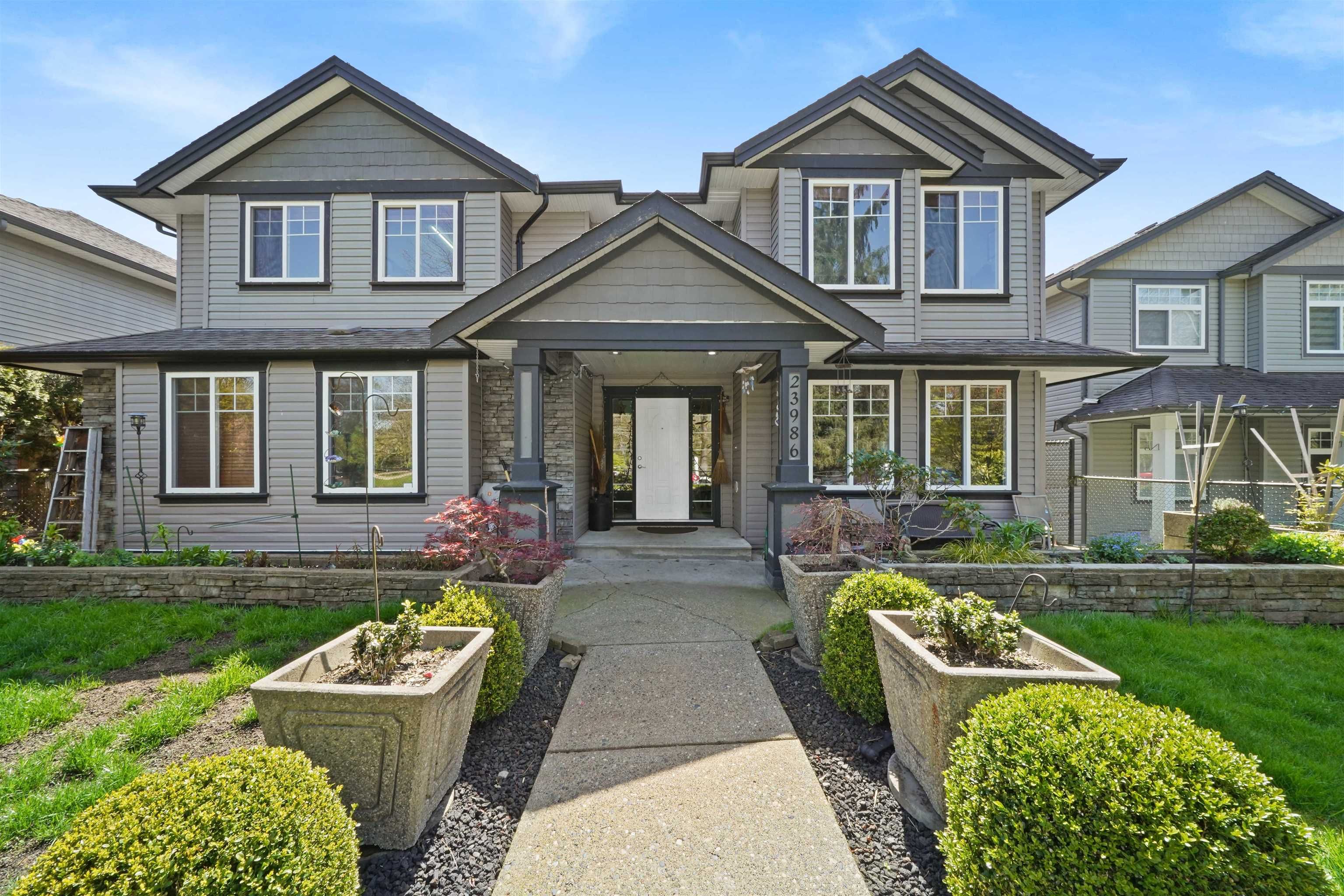 Main Photo: 23986 ABERNETHY Way in Maple Ridge: East Central House for sale : MLS®# R2772949