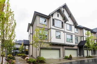 Photo 1: 102 30930 WESTRIDGE Place in Abbotsford: Abbotsford West Townhouse for sale in "Bristol Heights" : MLS®# R2877058