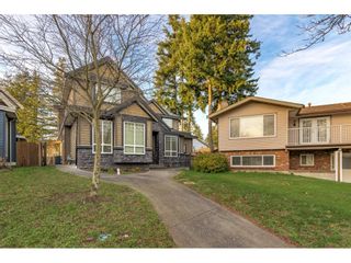 Photo 2: 15245 21A Avenue in Surrey: King George Corridor House for sale in "Beach Grove" (South Surrey White Rock)  : MLS®# R2639524