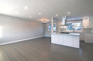 Photo 8: 102 Winston Drive SW in Calgary: Westgate Detached for sale : MLS®# A2012680