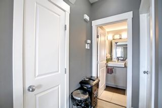 Photo 18: 6 67 West Coach Manor SW in Calgary: West Springs Row/Townhouse for sale : MLS®# A1226623