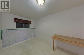 Photo 13: 1001 8 Street SW in Slave Lake: House for sale : MLS®# A2012755