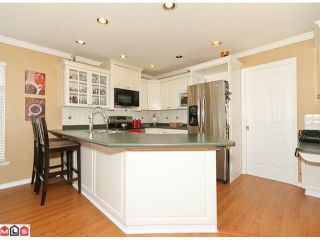 Photo 4: 6342 135 Street in Surrey: Panorama Ridge House for sale in "Heritage Woods" : MLS®# F1117563