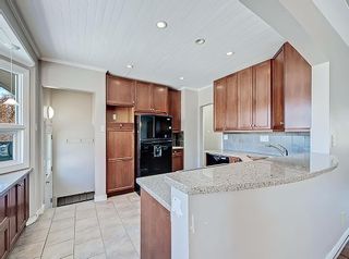 Photo 7: 708 Imperial Way SW in Calgary: Britannia Detached for sale : MLS®# A2040005