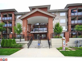 Photo 1: 102 5516 198 Street in Langley: Langley City Condo for sale in "Madison Villa" : MLS®# R2736503