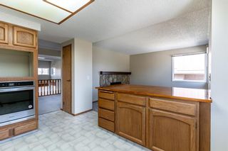Photo 21: 28 Glamis Gardens SW in Calgary: Glamorgan Row/Townhouse for sale : MLS®# A1205535