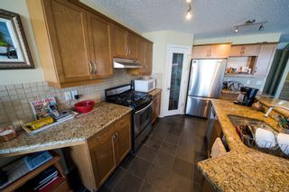 Photo 7: 292 Springborough Way SW in Calgary: Springbank Hill Detached for sale : MLS®# A1218463