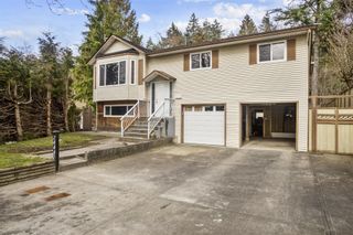 Photo 1: 14447 91B Avenue in Surrey: Bear Creek Green Timbers House for sale in "BEAR CREEK" : MLS®# R2759582