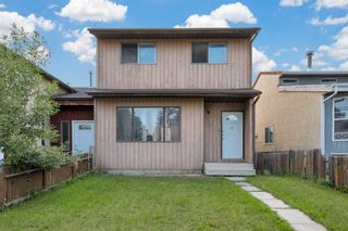 Photo 1: 223 Pinemill Mews NE in Calgary: Pineridge Semi Detached (Half Duplex) for sale : MLS®# A2066427