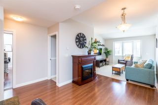 Photo 8: 307 19774 56 Avenue in Langley: Langley City Condo for sale : MLS®# R2437992