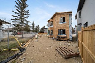 Photo 10: 18 Straddock Bay SW Calgary Home For Sale
