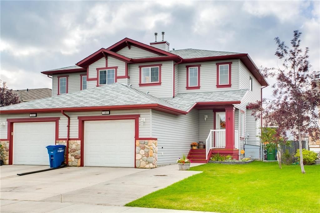 Main Photo: 560 Stonegate Way NW: Airdrie Semi Detached for sale : MLS®# A1220497