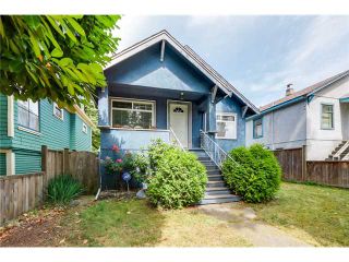 Photo 1: 2041 E 1ST Avenue in Vancouver: Grandview VE House for sale in "COMMERCIAL DRIVE" (Vancouver East)  : MLS®# V1079697