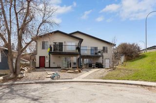 Main Photo: 503 34 Avenue NE in Calgary: Winston Heights/Mountview Semi Detached (Half Duplex) for sale : MLS®# A2128615