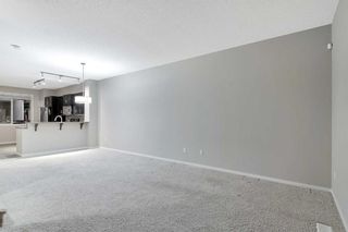 Photo 12: 1713 125 Panatella Way NW in Calgary: Panorama Hills Row/Townhouse for sale : MLS®# A2106214