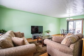 Photo 2: 9308 Allison Drive SE in Calgary: Acadia Detached for sale : MLS®# A1206863