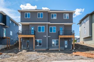 Photo 44: 182 River Heights Drive: Cochrane Semi Detached (Half Duplex) for sale : MLS®# A2013269