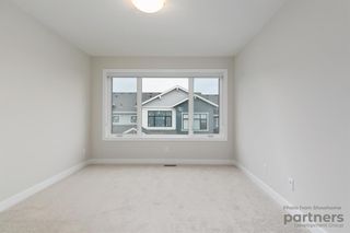 Photo 12: 948 Crestridge Common SW in Calgary: Crestmont Row/Townhouse for sale : MLS®# A2012906