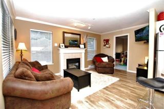 Photo 2: 205 33502 GEORGE FERGUSON Way in Abbotsford: Central Abbotsford Condo for sale in "Carina Court" : MLS®# R2215286