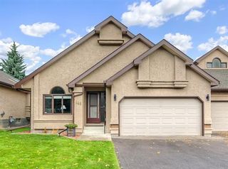 Photo 1: 146 Oakbriar Close SW in Calgary: Palliser Residential for sale ()  : MLS®# A1040586