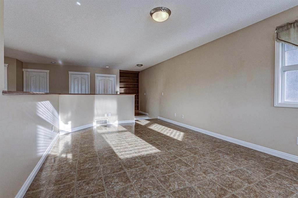Photo 5: Photos: 64 Everbrook Drive SW in Calgary: Evergreen Detached for sale : MLS®# A1053300