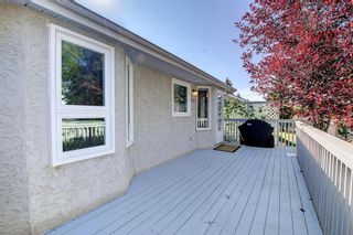 Photo 23: 297 Arbour Cliff Close NW in Calgary: Arbour Lake Semi Detached (Half Duplex) for sale : MLS®# A1255400
