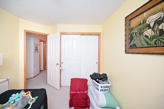 Photo 16: 128 Everridge Way SW in Calgary: Evergreen Detached for sale : MLS®# A1175019