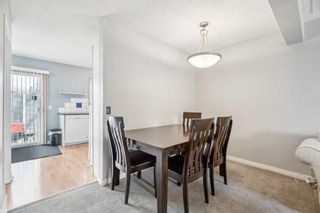 Photo 5: 40 Range Gardens NW in Calgary: Ranchlands Row/Townhouse for sale : MLS®# A2122528
