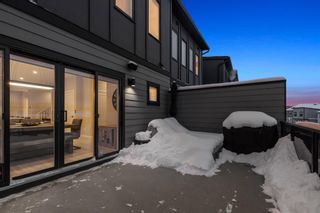 Photo 15: 3048 85 Street SW in Calgary: Springbank Hill Row/Townhouse for sale : MLS®# A2111255