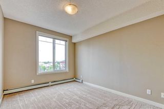 Photo 13: 401 156 Country Village Circle NE in Calgary: Country Hills Village Apartment for sale : MLS®# A2070060