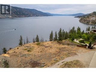 Photo 1: 180 Sheerwater Court Unit# 9 in Kelowna: Vacant Land for sale : MLS®# 10305422