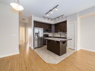 Photo 5: 676 Cranford Walk SE in Calgary: Cranston Row/Townhouse for sale : MLS®# A1209763