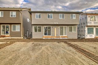 Photo 3: 20865 Main Street SE in Calgary: Seton Semi Detached (Half Duplex) for sale : MLS®# A2095931