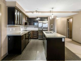 Photo 4: 102 1805 26 Avenue SW South Calgary Calgary Alberta T2T 1E2 Home For Sale CREB MLS A2019377