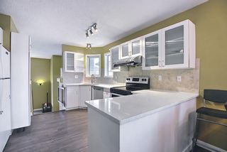 Photo 12: 11 Coverdale Way NE in Calgary: Coventry Hills Detached for sale : MLS®# A1085529
