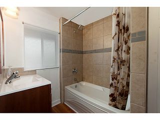 Photo 12: 1718 COTTON Drive in Vancouver: Grandview VE House for sale in "Commercial Drive" (Vancouver East)  : MLS®# V1009711