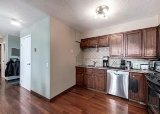 Photo 4: 2005 145 Point Drive NW in Calgary: Point McKay Apartment for sale : MLS®# A2053242