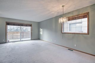 Photo 13: 49 SUN HARBOUR Road in Calgary: Sundance Row/Townhouse for sale : MLS®# A1102875
