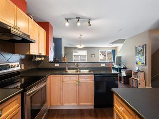 Photo 11: 23 Toscana Gardens NW in Calgary: Tuscany Row/Townhouse for sale : MLS®# A1221514