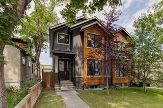 Photo 1: 222 19 Avenue NW in Calgary: Tuxedo Park Semi Detached (Half Duplex) for sale : MLS®# A2067139