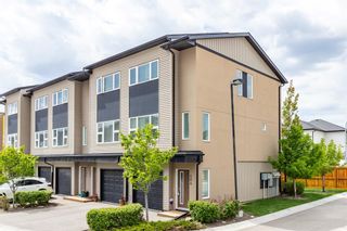 Photo 2: 404 Covecreek Circle NE in Calgary: Coventry Hills Row/Townhouse for sale : MLS®# A1217696