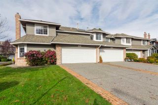 Photo 1: 6117 W BOUNDARY Drive in Surrey: Panorama Ridge Townhouse for sale in "LAKEWOOD GARDENS" : MLS®# R2318441