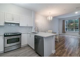 Photo 2: 103 960 LYNN VALLEY Road in North Vancouver: Lynn Valley Condo for sale in "Balmoral House" : MLS®# R2636385